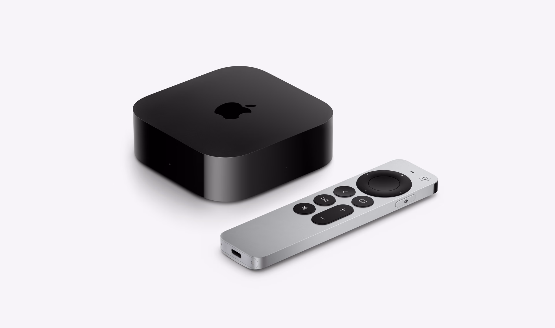Apple TV 4K and Siri Remote on a light background