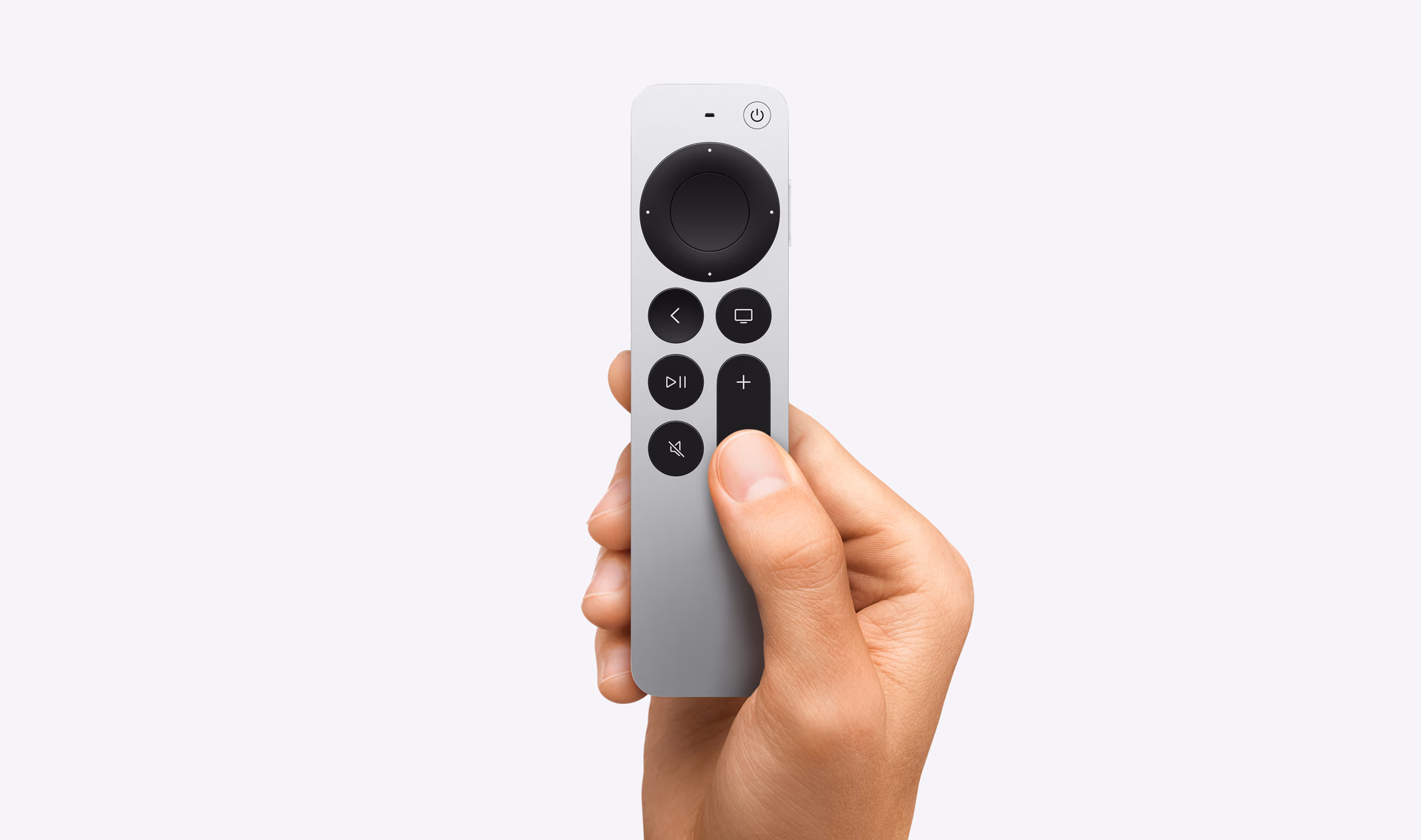 Hand holding the new Siri Remote