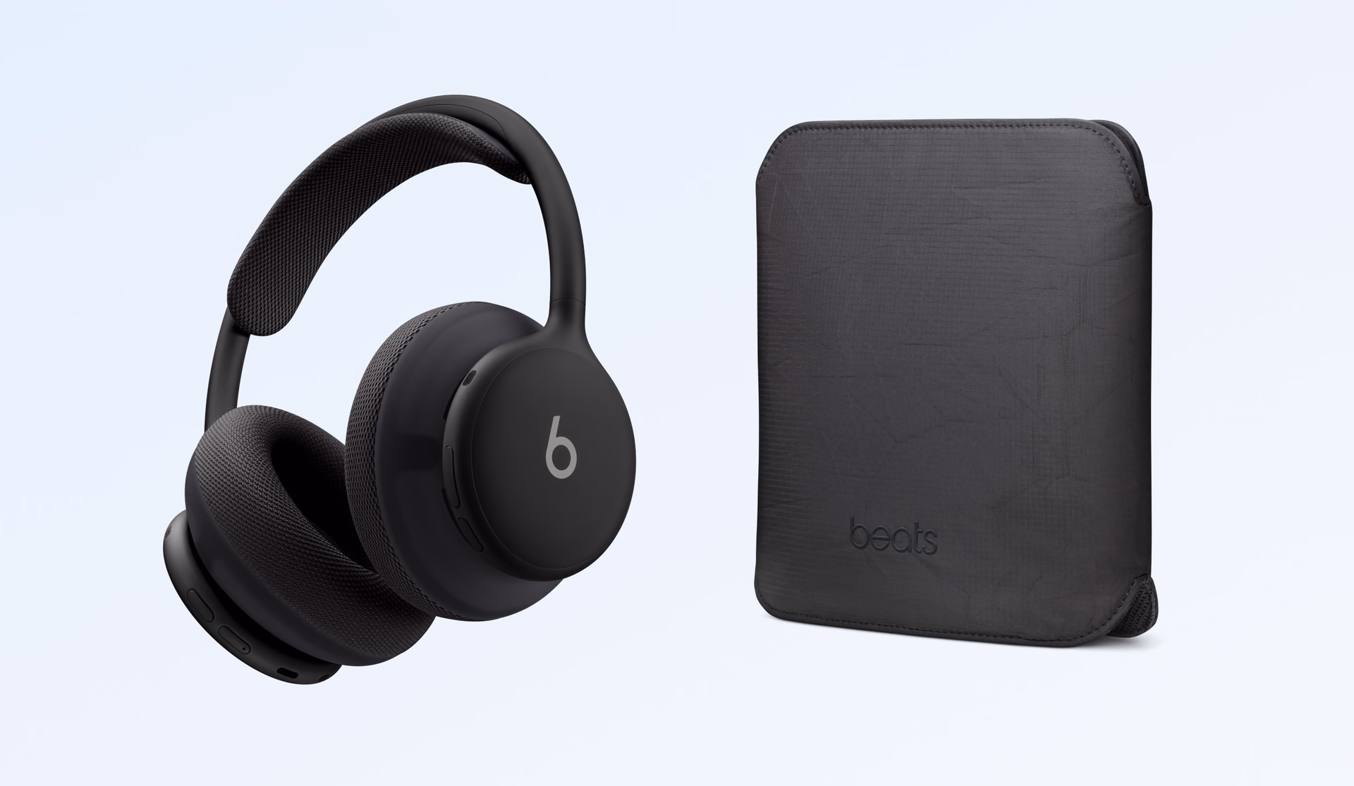 Black Beats 360 next to their carrying pouch