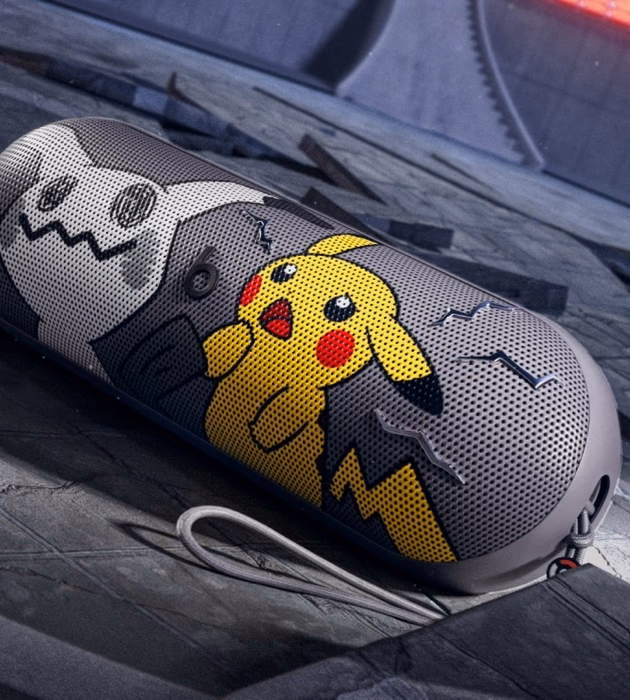 Beats Pill Pokémon resting on a dark stage