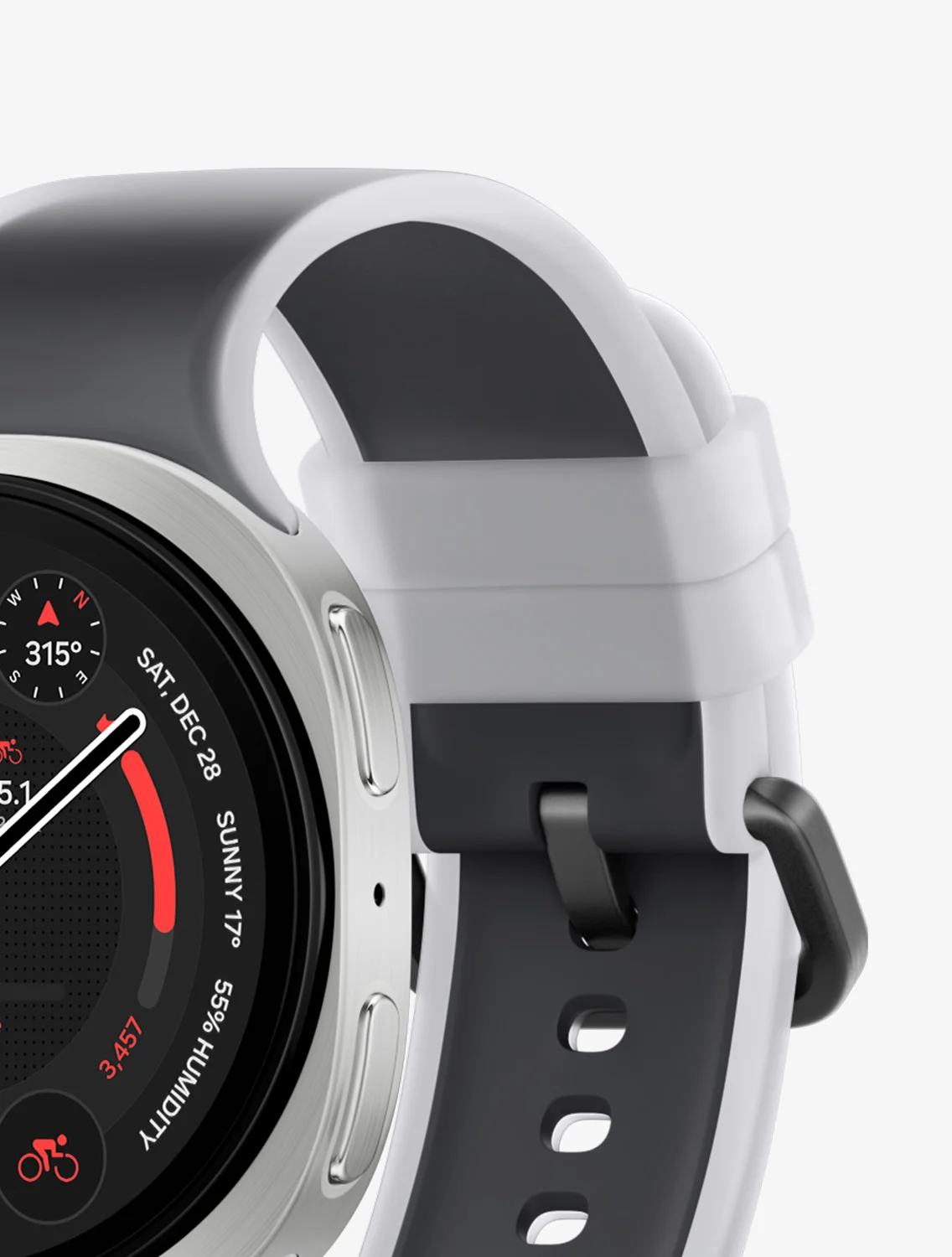 El Galaxy Watch 9 plateado con correa de silicona en dos tonos, blanco por fuera y gris por dentro