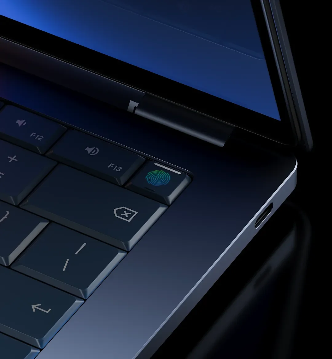 Close-up of the Googlebook keyboard showing an F13 key with a light blue illuminated fingerprint sensor and, beside it, a USB-C port on the dark blue chassis.