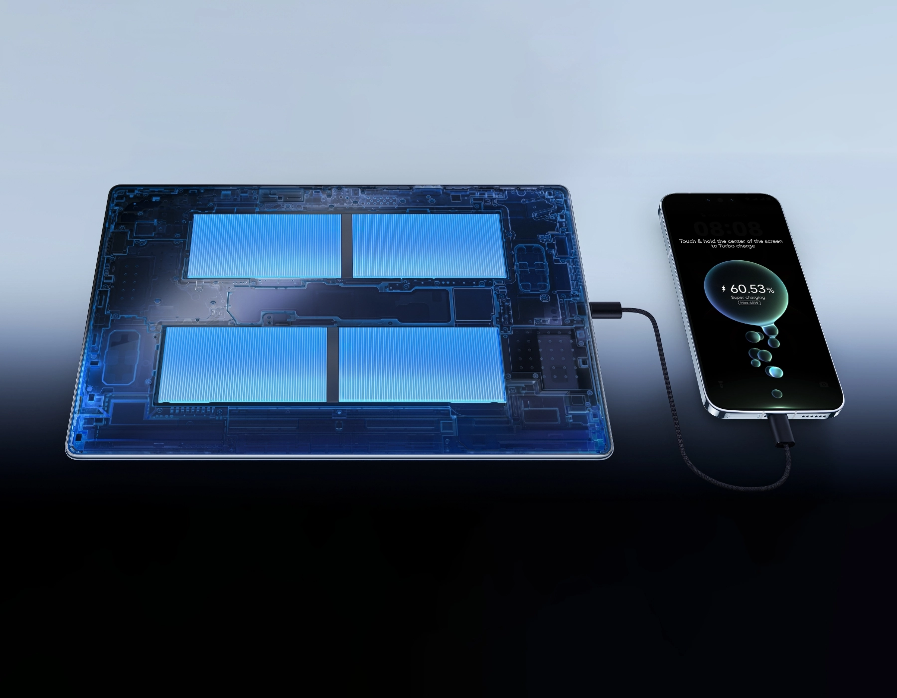 Vista interna de la batería de la Huawei MatePad Pro Max cargando un teléfono a 40 W de forma inversa.