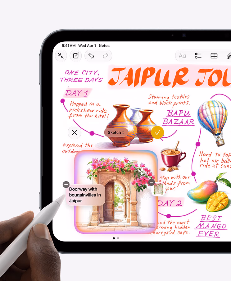 A hand uses the Apple Pencil on an illustrated note about a trip to Jaipur on the iPad mini