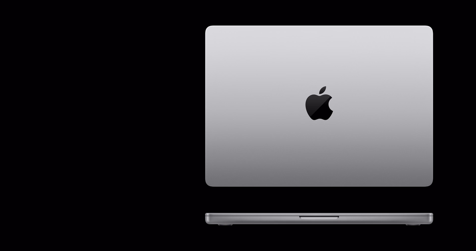 Silver MacBook Pro viewed from above and in profile