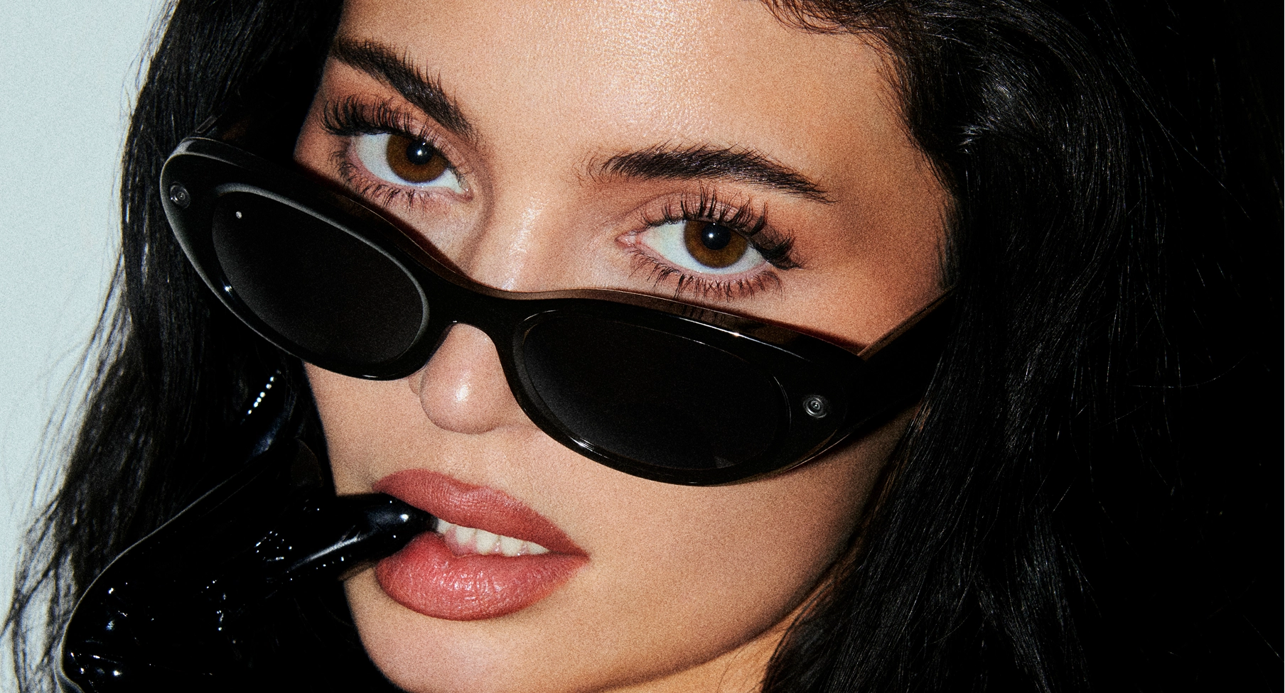 Kylie Jenner wearing Meta Starfire Kylie Edition with a black frame and black lenses