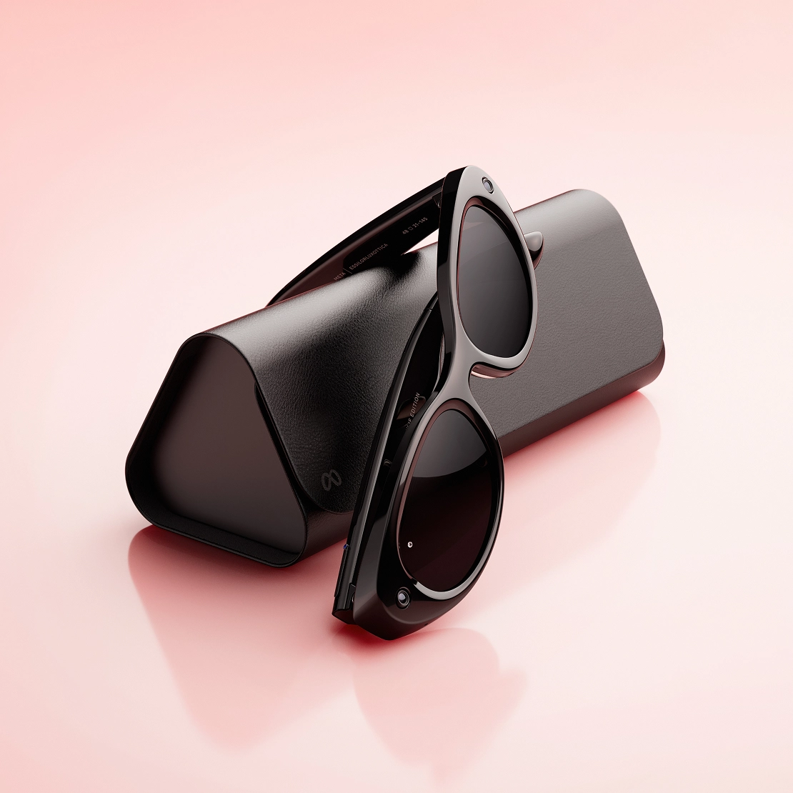 Black Meta Starfire Kylie Edition resting on its exclusive charging case
