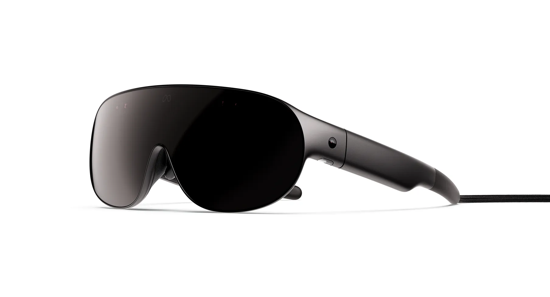 Meta VR Glasses seen from the front and side next to their optical cable