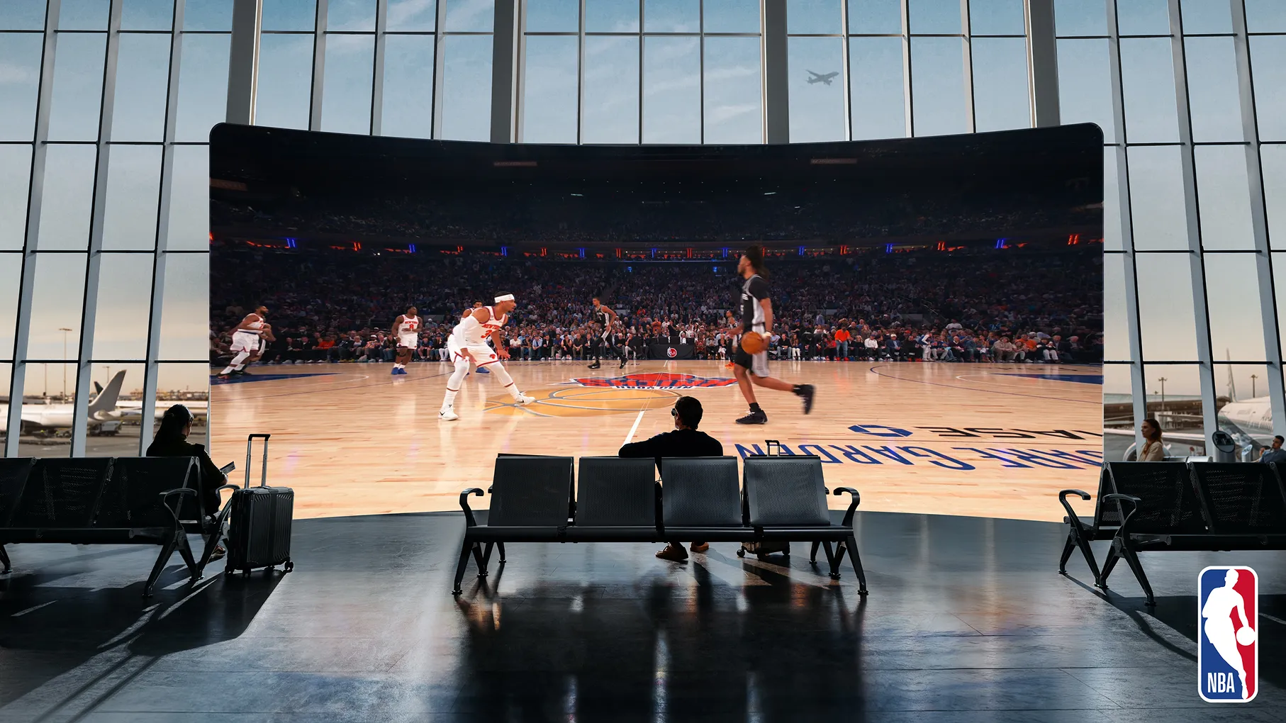 Person watching a basketball game on a large virtual screen