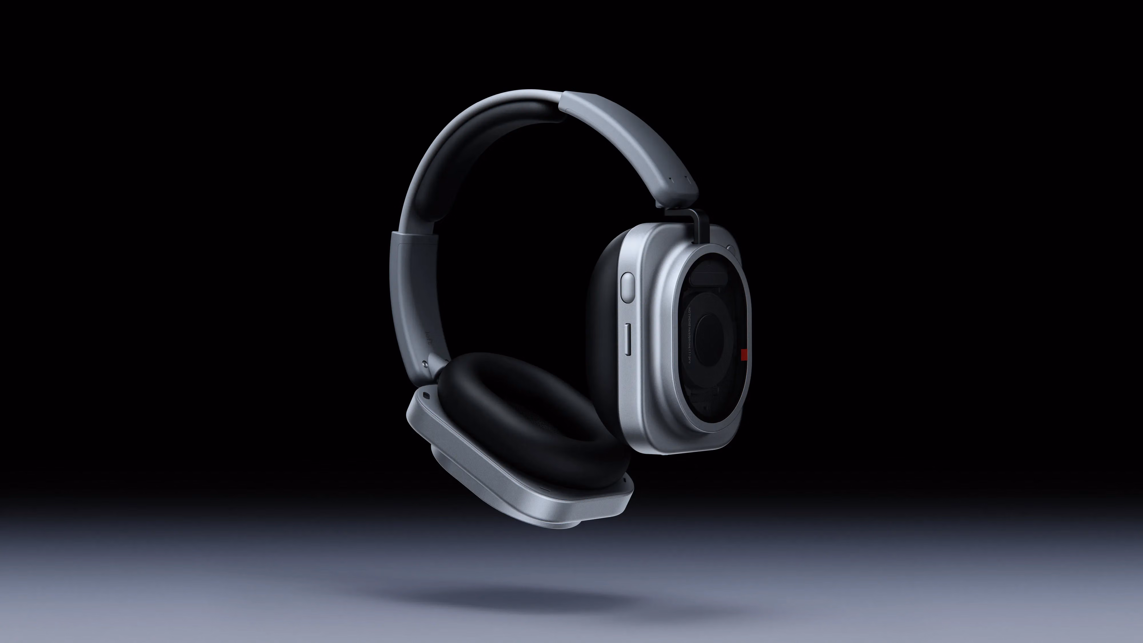 White Headphone (1) Pro seen in three-quarter view on a dark background