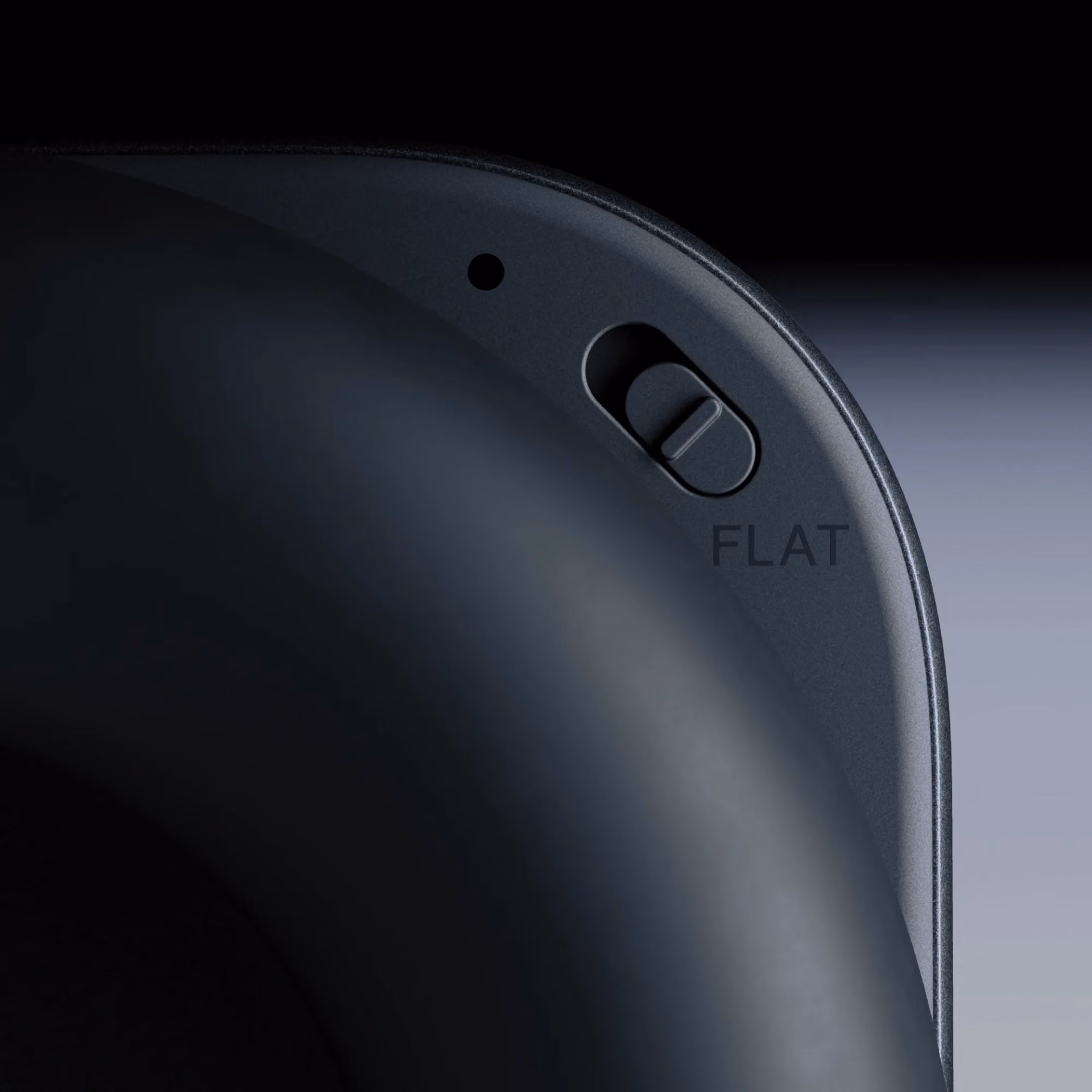 Sliding switch labeled FLAT on the Headphone (1) Pro earcup