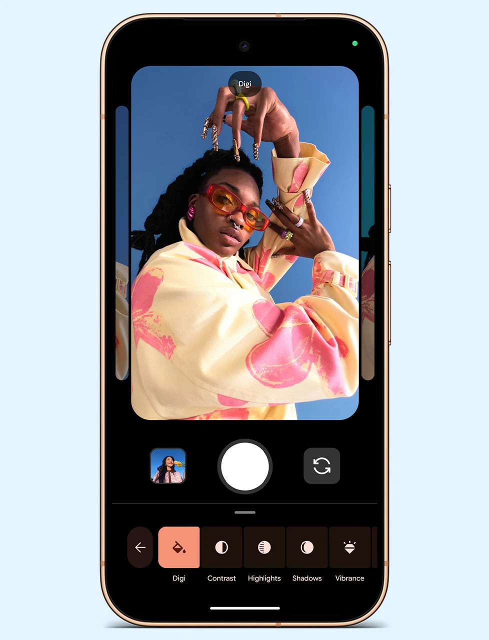 La app de cámara del Pixel 11 con el estilo Digi aplicado y los controles de contraste y sombras debajo
