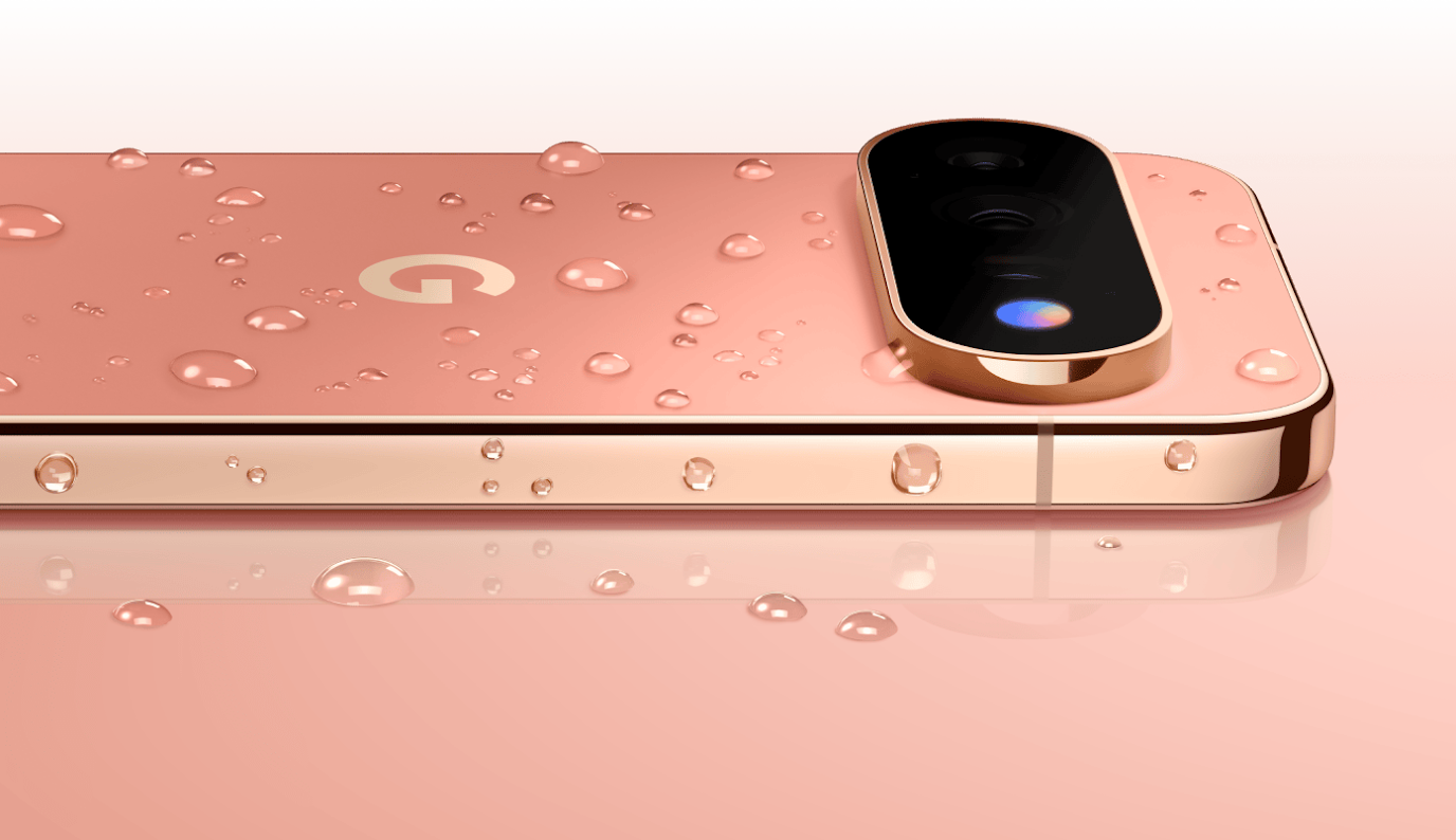 El Pixel 11 Pro en Canyon cubierto de gotas de agua sobre una superficie reflectante