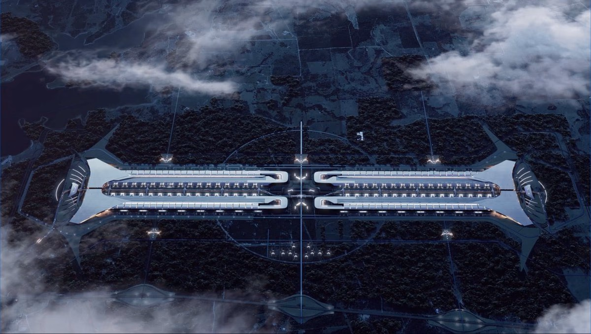 Render cenital del campus de Terafab entre nubes, con las cuatro naves de fabricación alineadas.